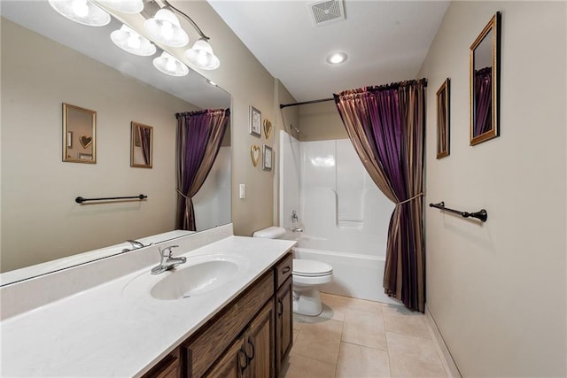 full bathroom featuring tile patterned floors, vanity, toilet, and shower / tub combo with curtain