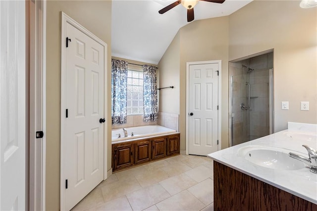 bathroom featuring ceiling fan, plus walk in shower, tile patterned floors, lofted ceiling, and vanity