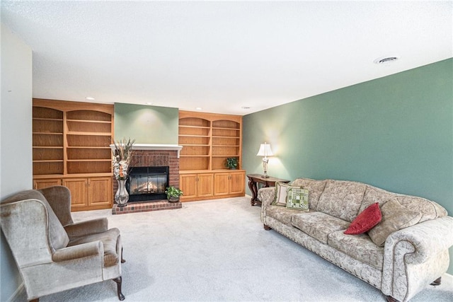 living room with built in features, carpet floors, and a brick fireplace