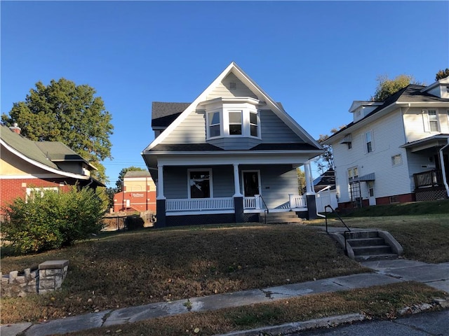 view of front of home featuring covered porch