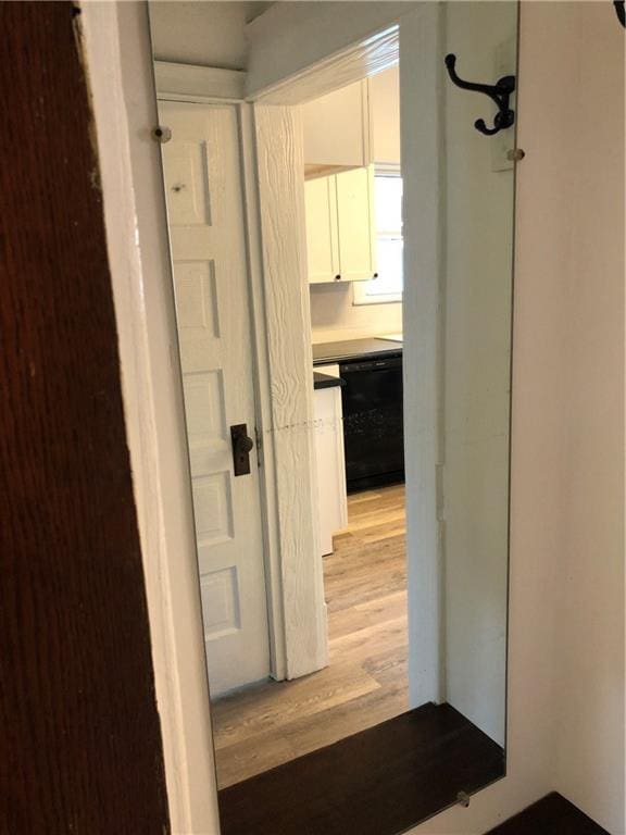 corridor featuring light hardwood / wood-style flooring