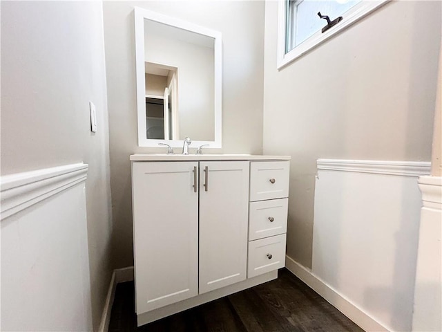 bathroom with wood-type flooring and vanity