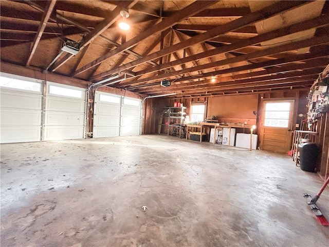 garage featuring a garage door opener