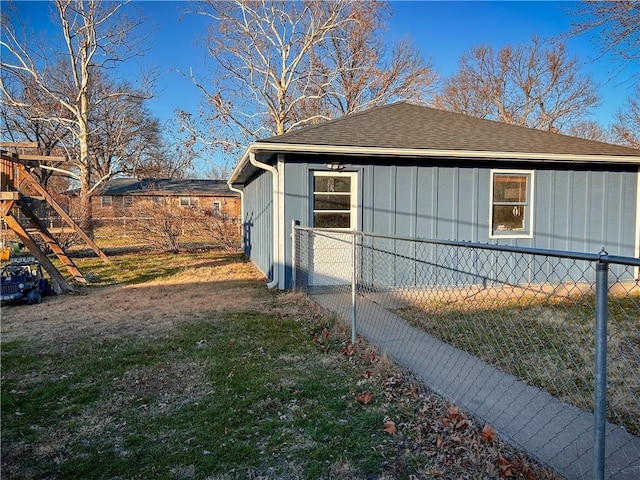 view of property exterior featuring a yard