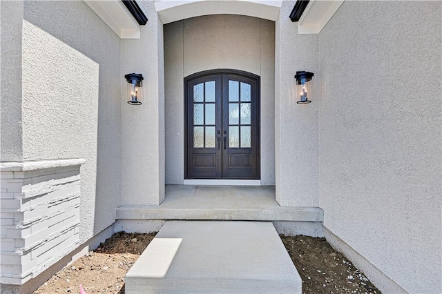 entrance to property with french doors