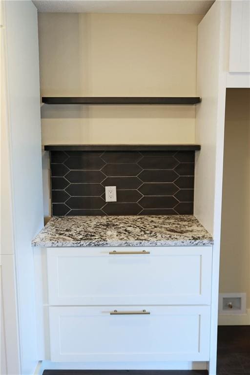 interior details featuring backsplash