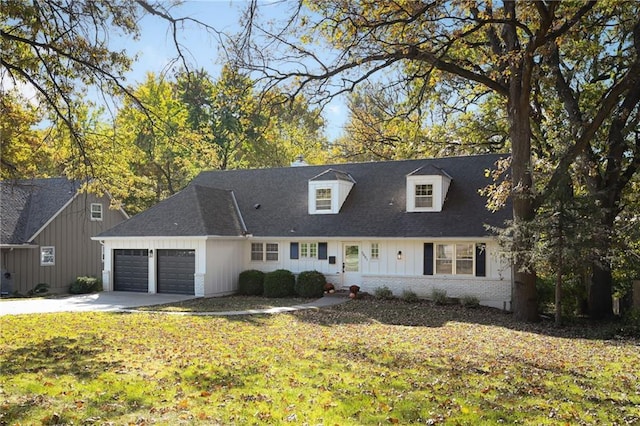 cape cod-style house with a garage