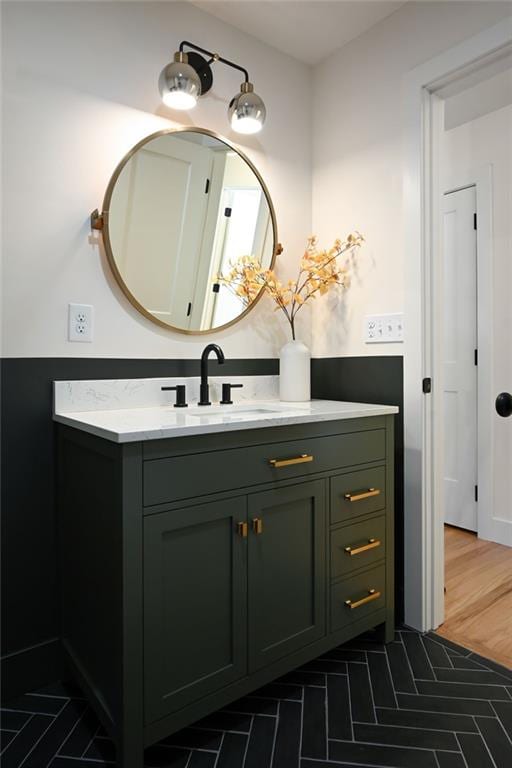 bathroom featuring hardwood / wood-style floors and vanity