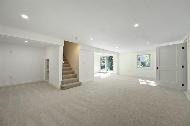 basement with light carpet