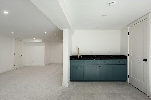 kitchen featuring light colored carpet