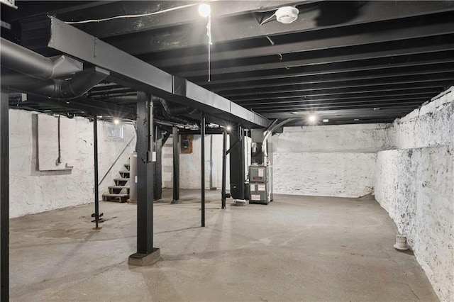 basement featuring heating unit