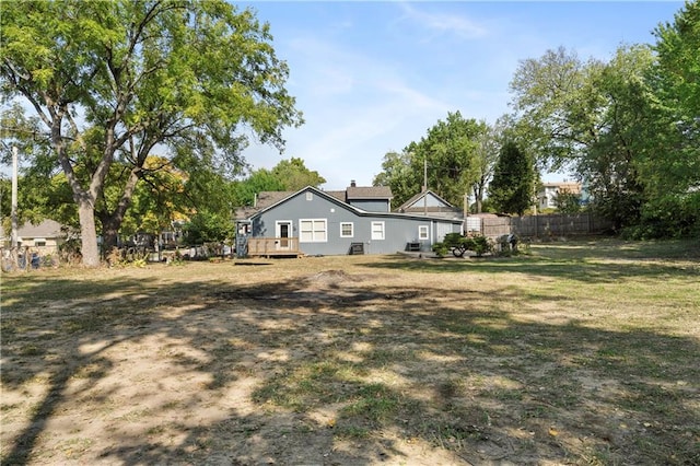 view of yard with a wooden deck