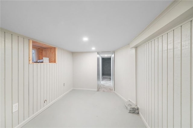 basement with wood walls