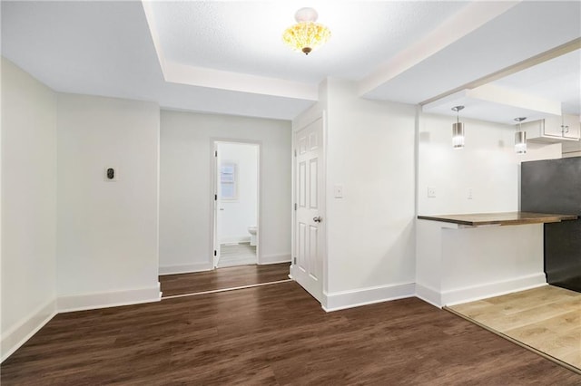 interior space with dark hardwood / wood-style flooring