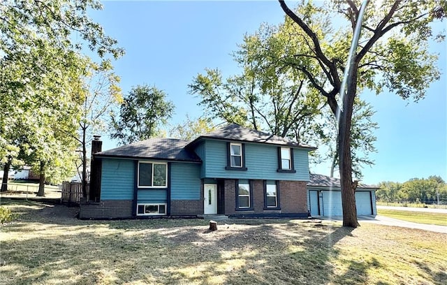 view of front facade featuring an outdoor structure, a garage, and a front lawn