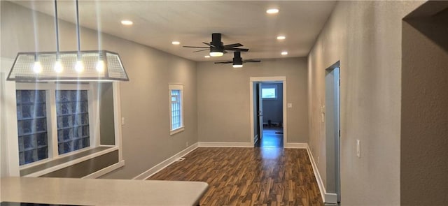 hall with dark hardwood / wood-style floors