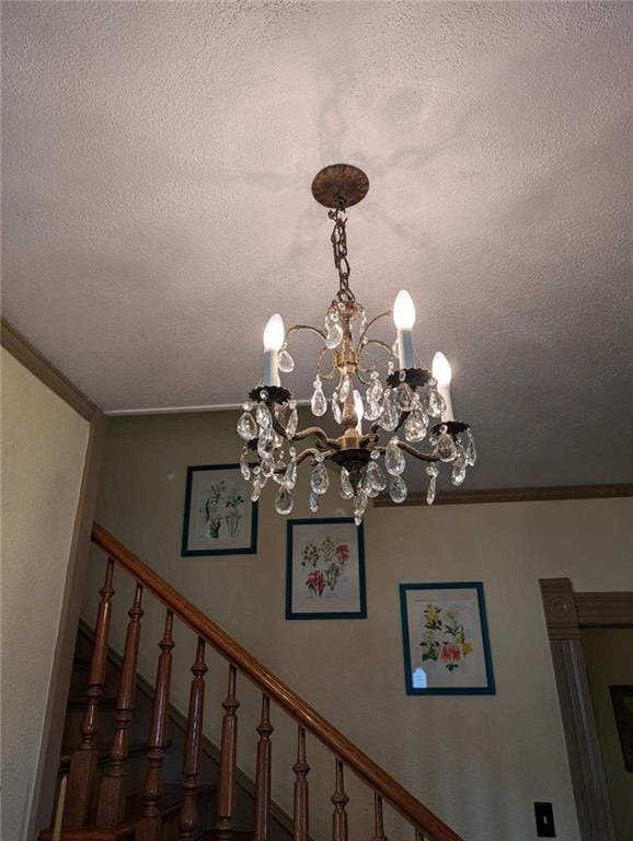 detailed view of a chandelier and ornamental molding