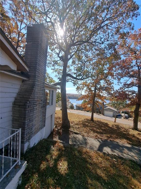 view of home's exterior featuring a water view