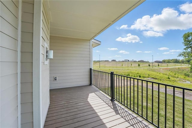 balcony featuring a rural view