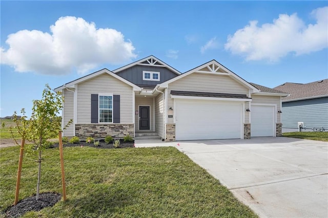 craftsman-style home with an attached garage, stone siding, a front yard, concrete driveway, and board and batten siding