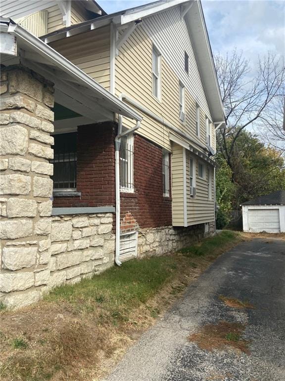 view of side of property featuring a garage