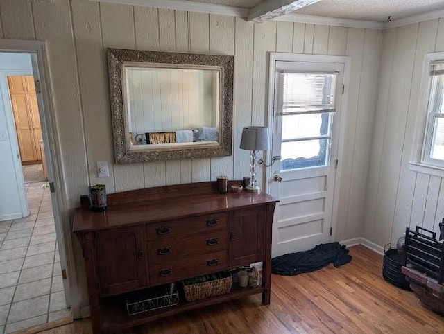 interior space with light hardwood / wood-style floors and plenty of natural light