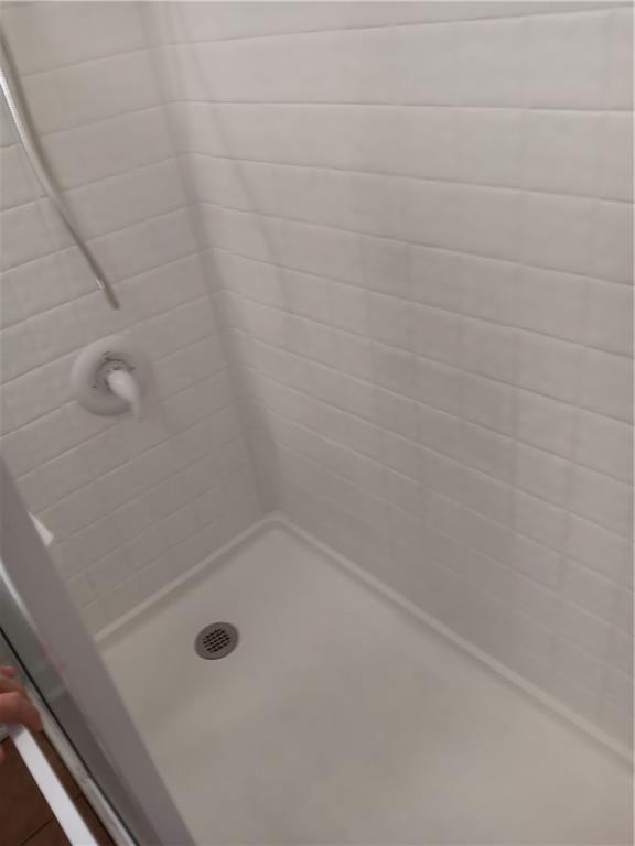 305 18th Ave N, Greenwood, MO 63034 - full bath with a stall shower