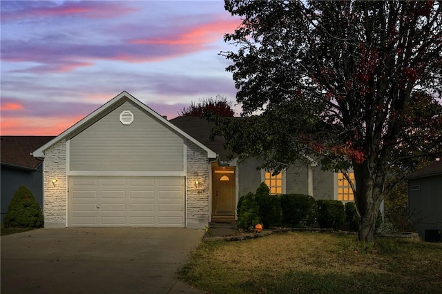 view of front of property featuring a garage