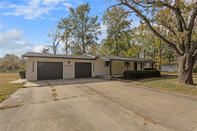 single story home featuring a garage