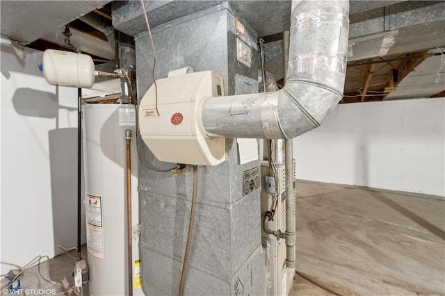 utility room featuring water heater