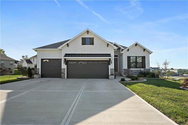 view of front facade featuring a front yard