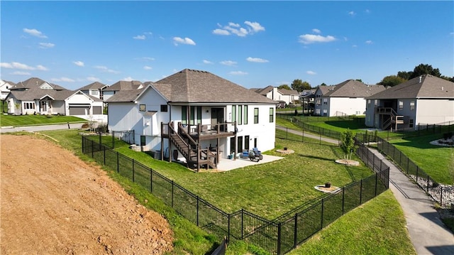 back of property featuring a patio, a garage, and a lawn