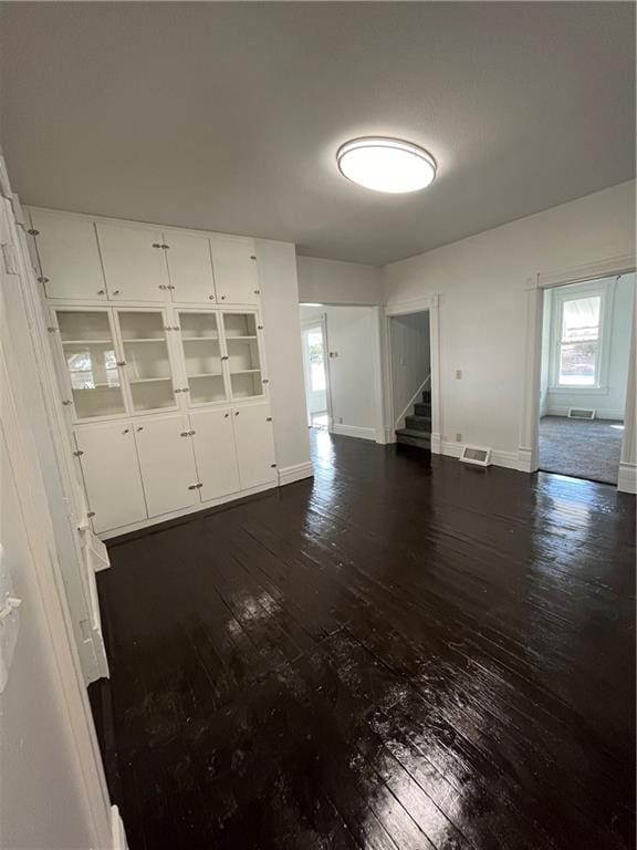 interior space featuring dark hardwood / wood-style flooring