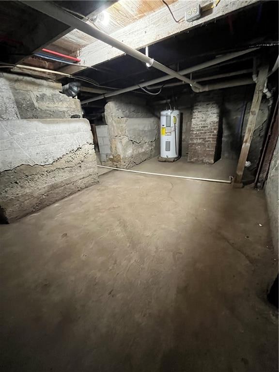 basement featuring water heater