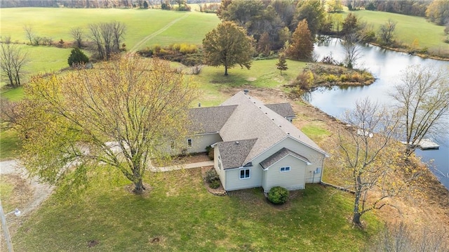 birds eye view of property with a water view and a rural view