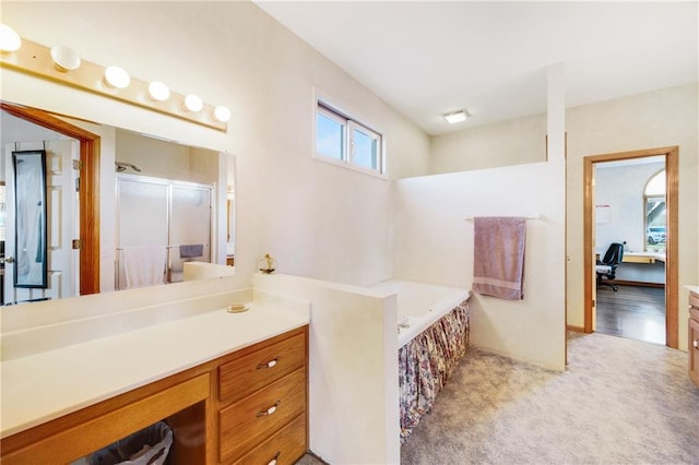 bathroom with vanity and plus walk in shower