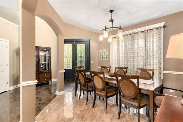 dining room with a chandelier