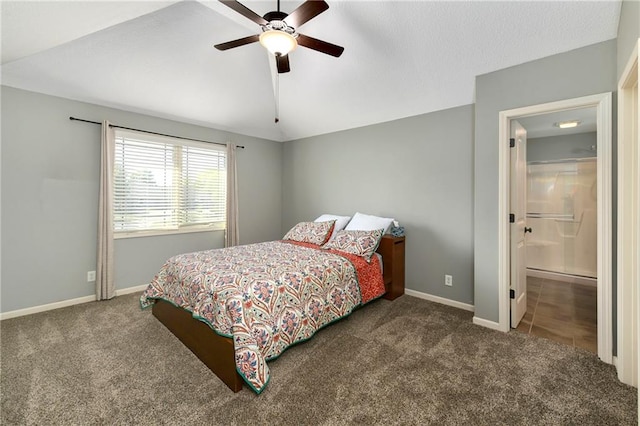 bedroom with connected bathroom, ceiling fan, and dark carpet