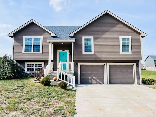 bi-level home featuring a garage