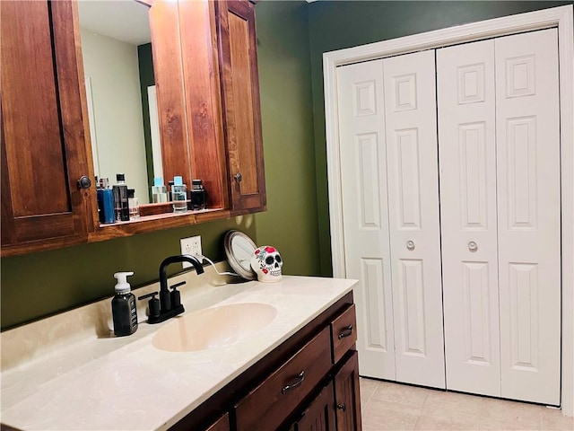 bathroom featuring vanity and tile patterned flooring