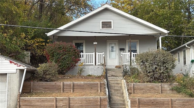 bungalow-style home featuring covered porch