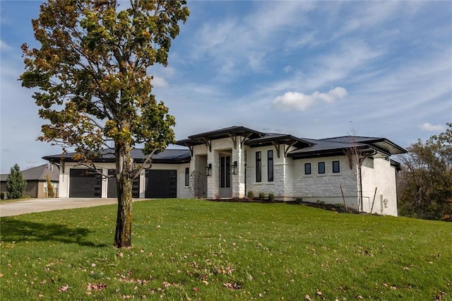 3411 S Mize Ridge Ct, Independence, MO 64057 - prairie-style house featuring stone siding, an attached garage, driveway, and a front yard