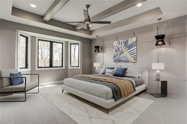 bedroom featuring light carpet, ceiling fan, and beam ceiling