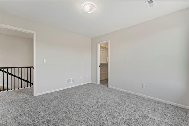 spare room with carpet