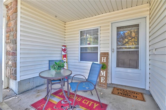 entrance to property featuring covered porch