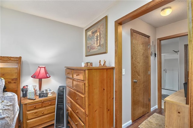 interior space featuring dark hardwood / wood-style floors and a closet