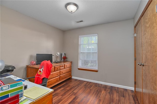 office area with dark hardwood / wood-style flooring