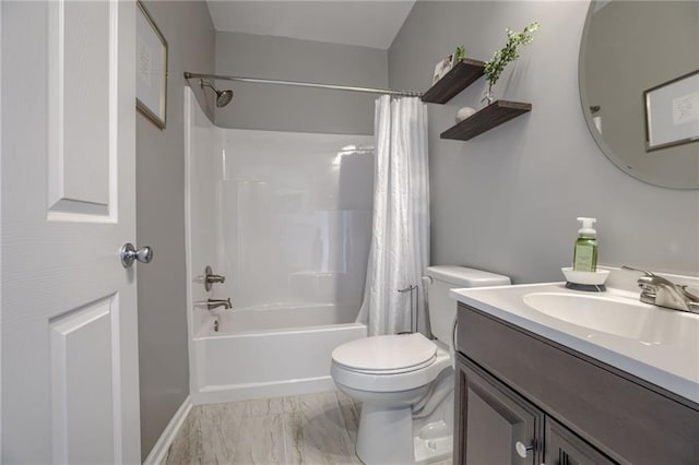 full bathroom featuring toilet, vanity, and shower / bath combination with curtain