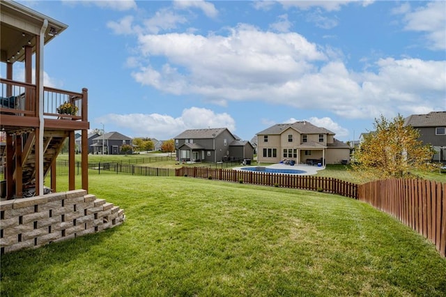 view of yard with a wooden deck