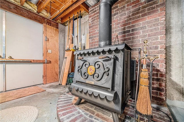 room details with a wood stove and concrete flooring